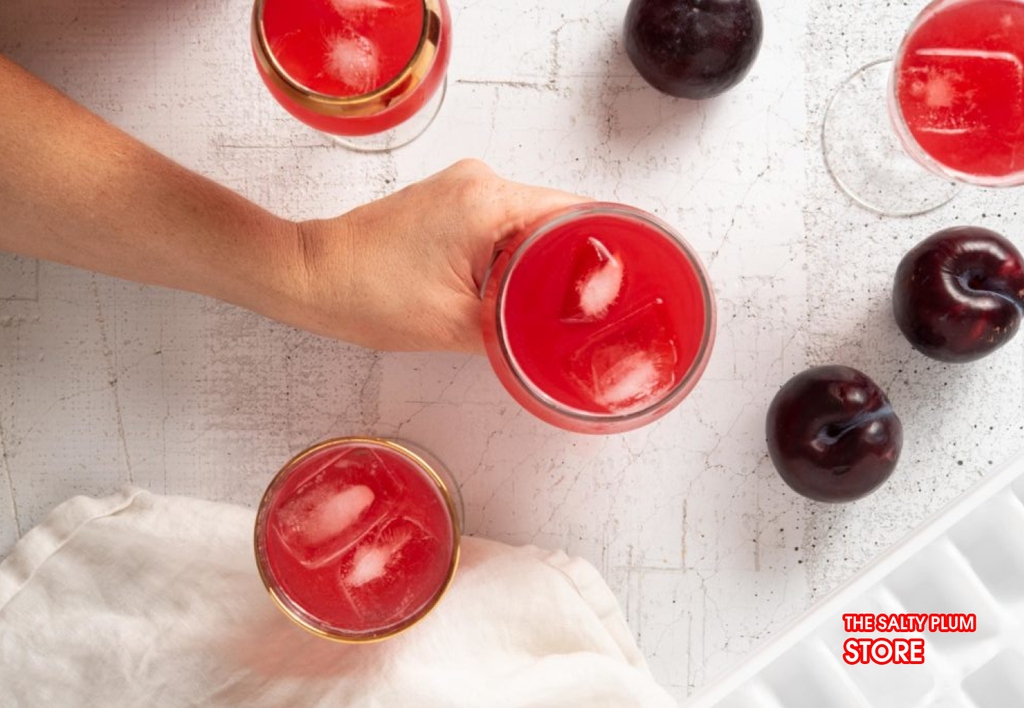 Paired salty plum tweed heads with drinks